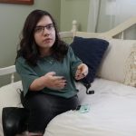 Natalia-on-bed-withphone-e1736222314321.jpeg
