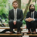 alex-adam-scott-and-kurt-jason-schwartzman-sitting-on-a-bench-in-the-overnight.jpg