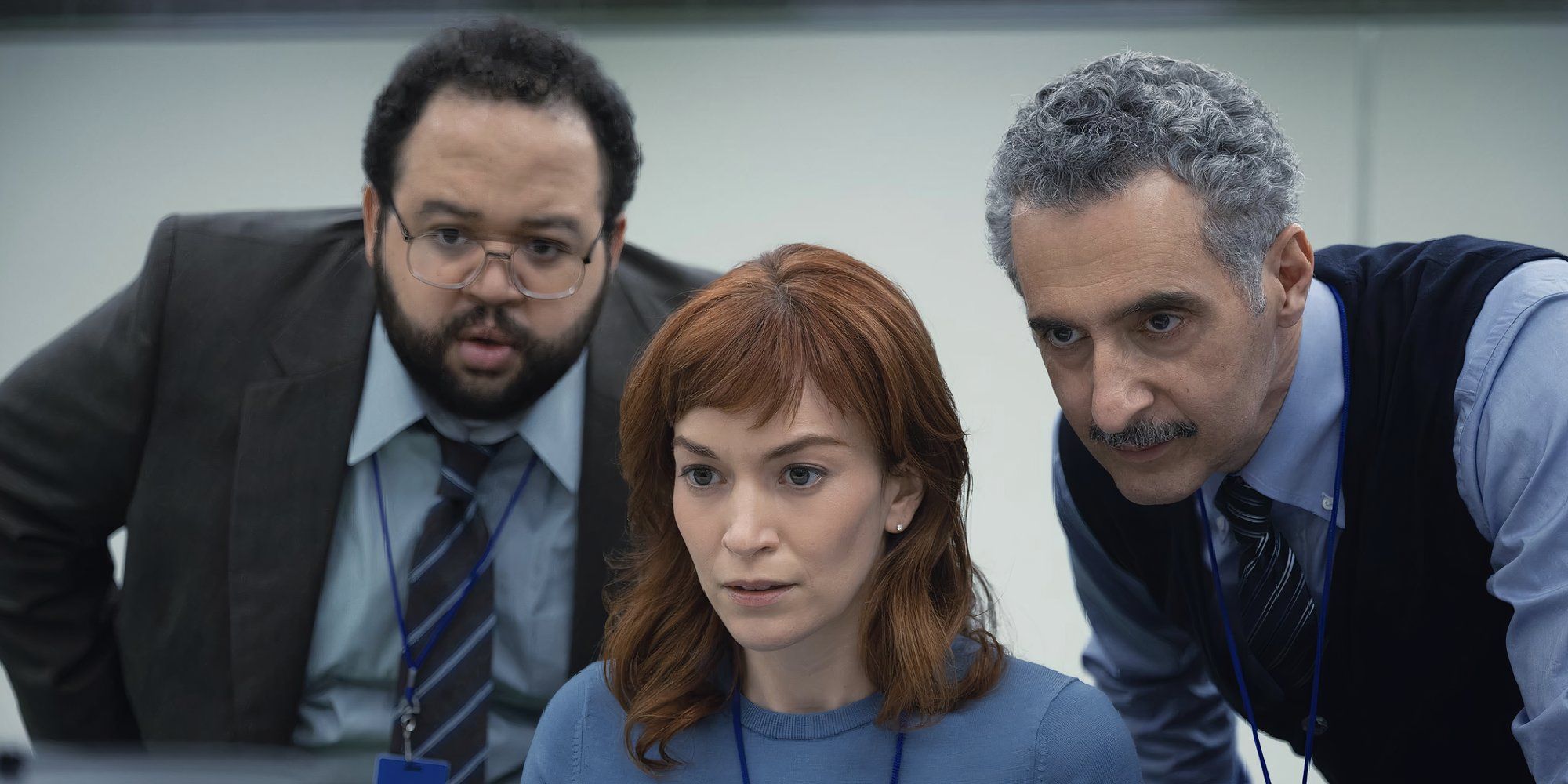 john-turturro-britt-lower-and-zach-cherry-in-severance-half-loop-looking-at-a-computer.jpg