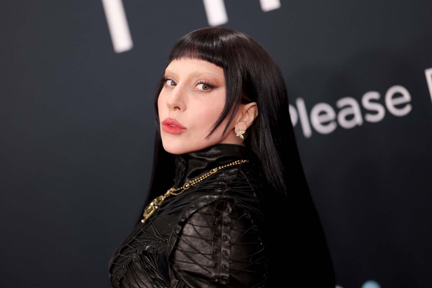 Lady Gaga poses at the Grammy Awards.