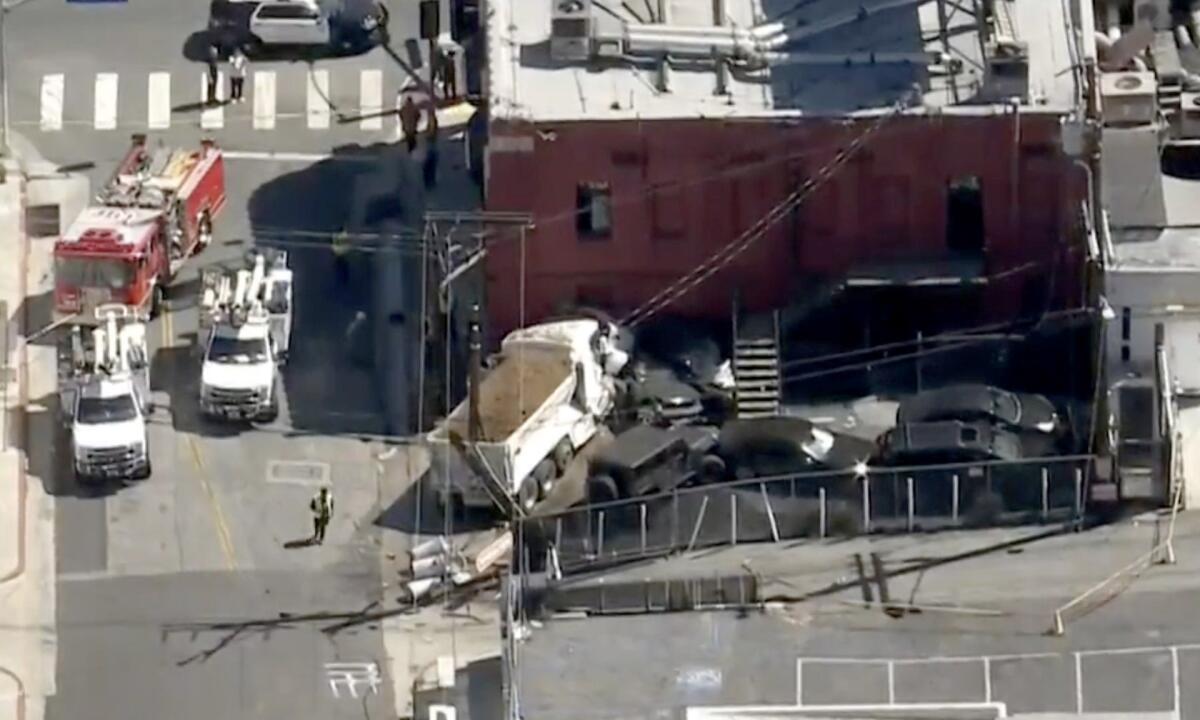 Dump Truck Crashes Into Whisky a Go Go