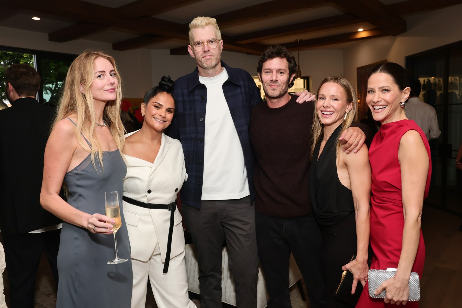 Justine Lupe, Netflix Chief Content Officer Netflix Bela Bajaria, Timothy Simons, Adam Brody, Kristen Bell and Jackie Tohn attend Netflix's 2025 Emmy's Toast on Sept. 12 in Studio City.